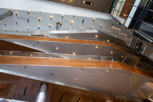 A modern interior showcasing various types of flooring materials in a bright space.