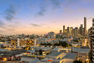 city with high rise buildings under blue sky during daytime