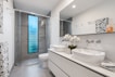white ceramic sink with mirror