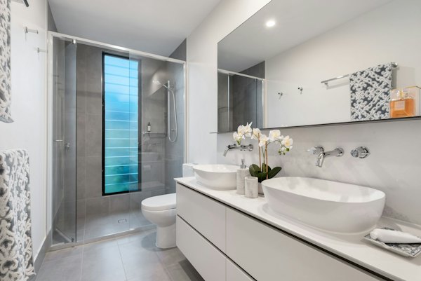 New white basin and mirror after repair