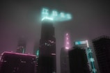 A futuristic cityscape at night with towering skyscrapers and swirling mist.
