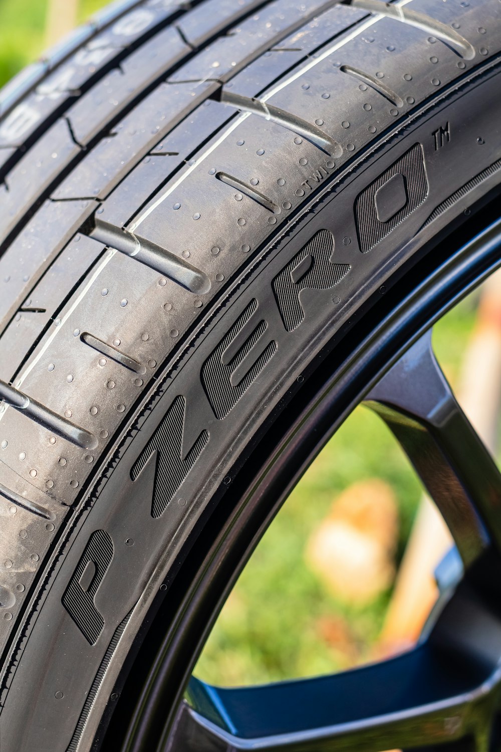 black car wheel in close up photography