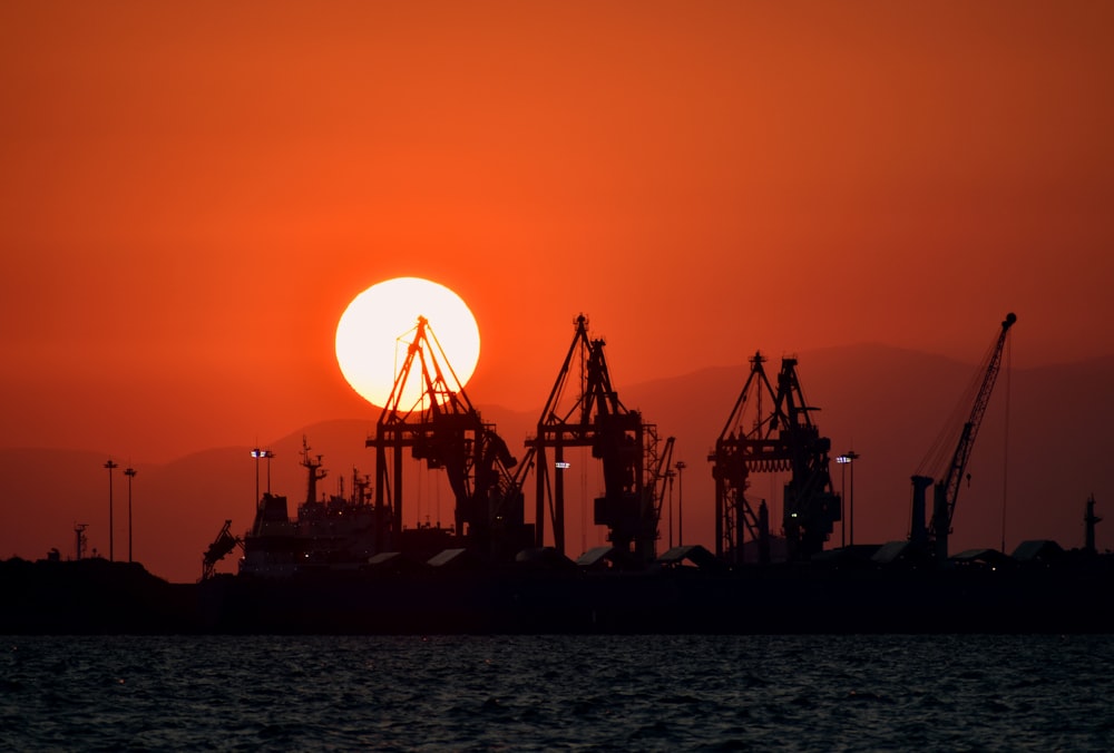 silhouette of buildings during sunset