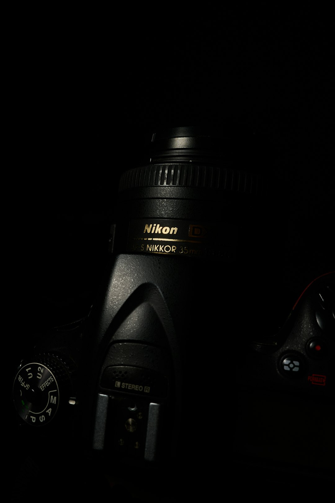 black nikon dslr camera on white surface