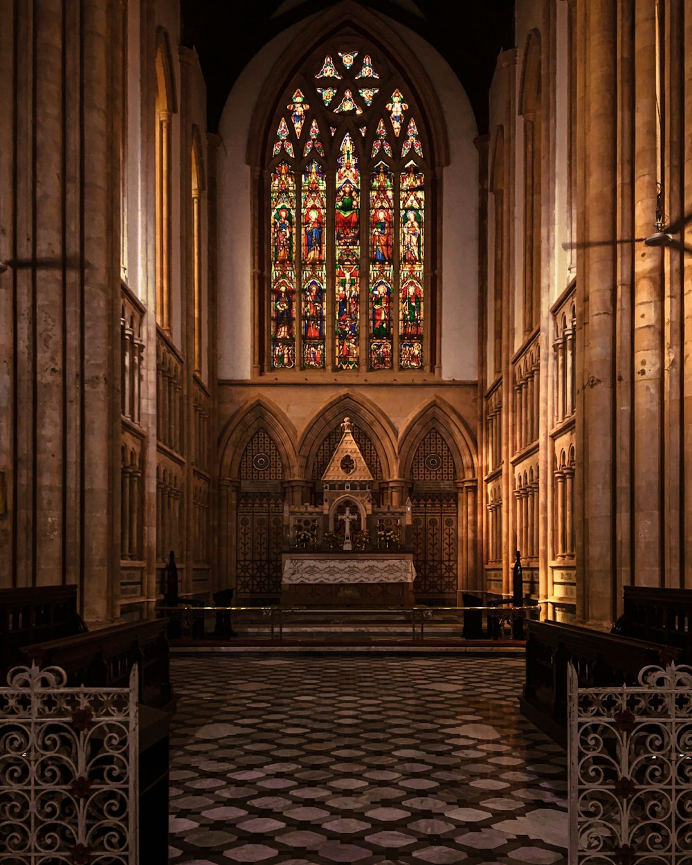 church interior with people sitting on bench