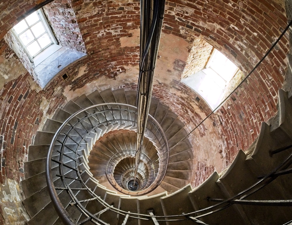 brown and white concrete spiral staircase