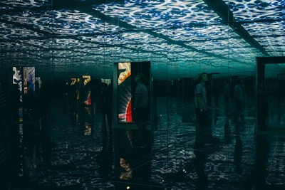 A sleek quantum state mirror reflecting shifting data patterns in a dark room.