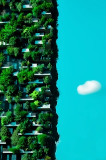 Lush vertical garden wrapping an office building, showcasing vibrant green plants and natural textures.