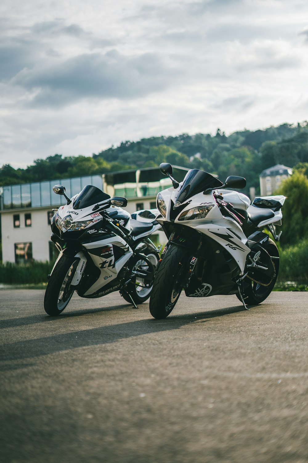 black and white sports bike on road during daytime