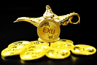 gold round coin with black background