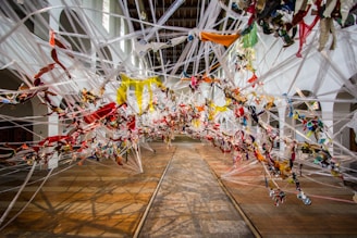 A mixed-media fiber art installation incorporating natural fibers and found objects from North Alabama.