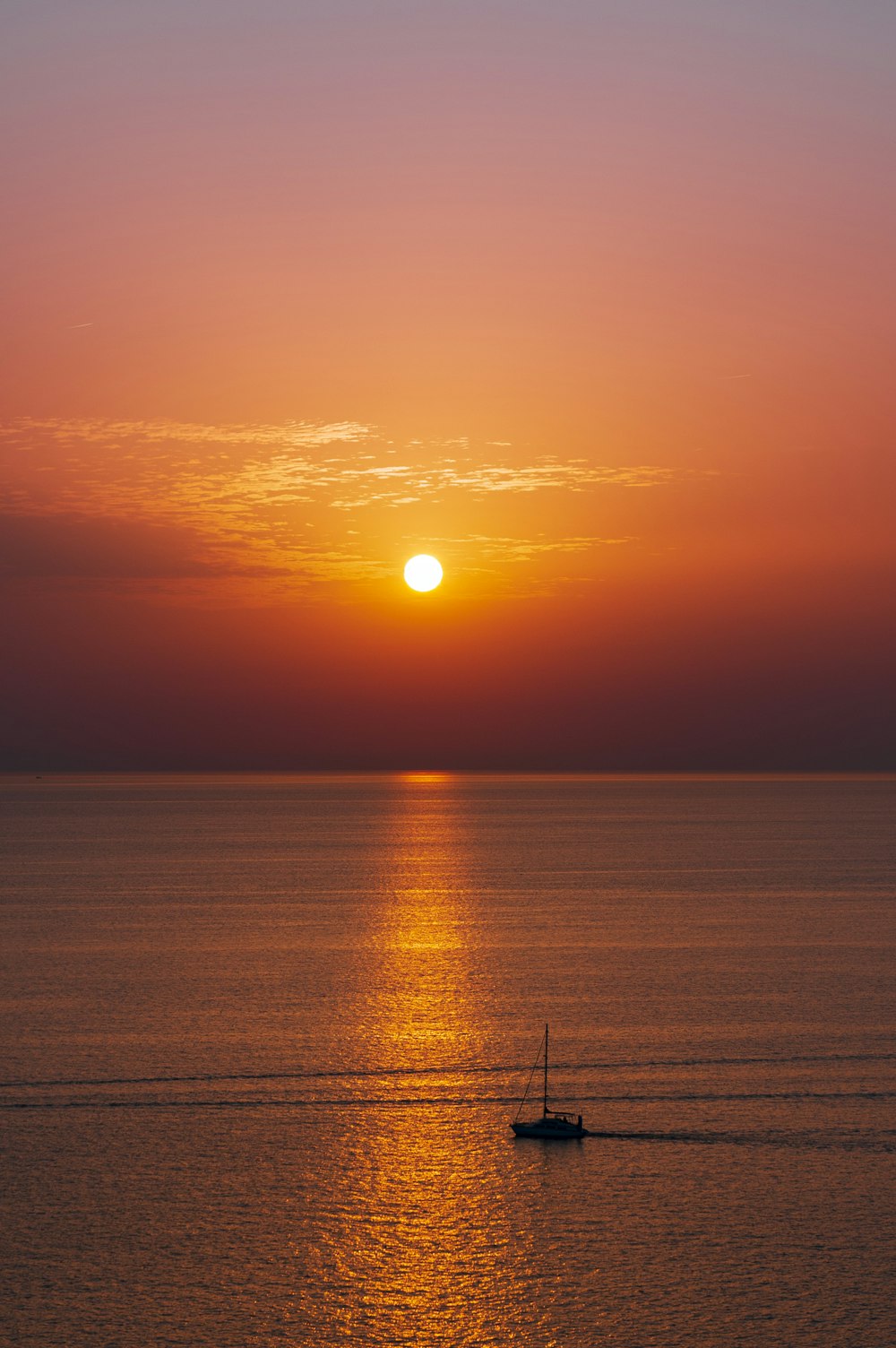 body of water during sunset