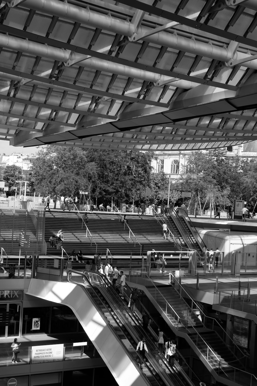 grayscale photo of a train station