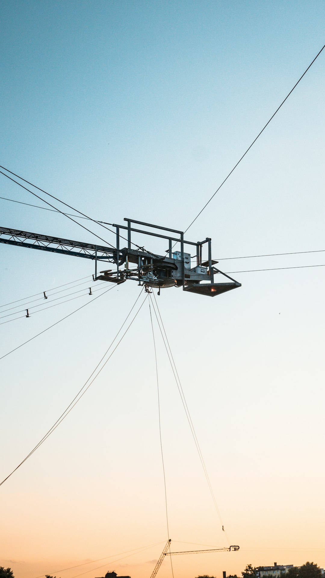 black cable car under white sky during daytime