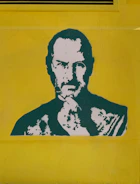 Close-up of a neon lime green graphic tee with bold street art design
