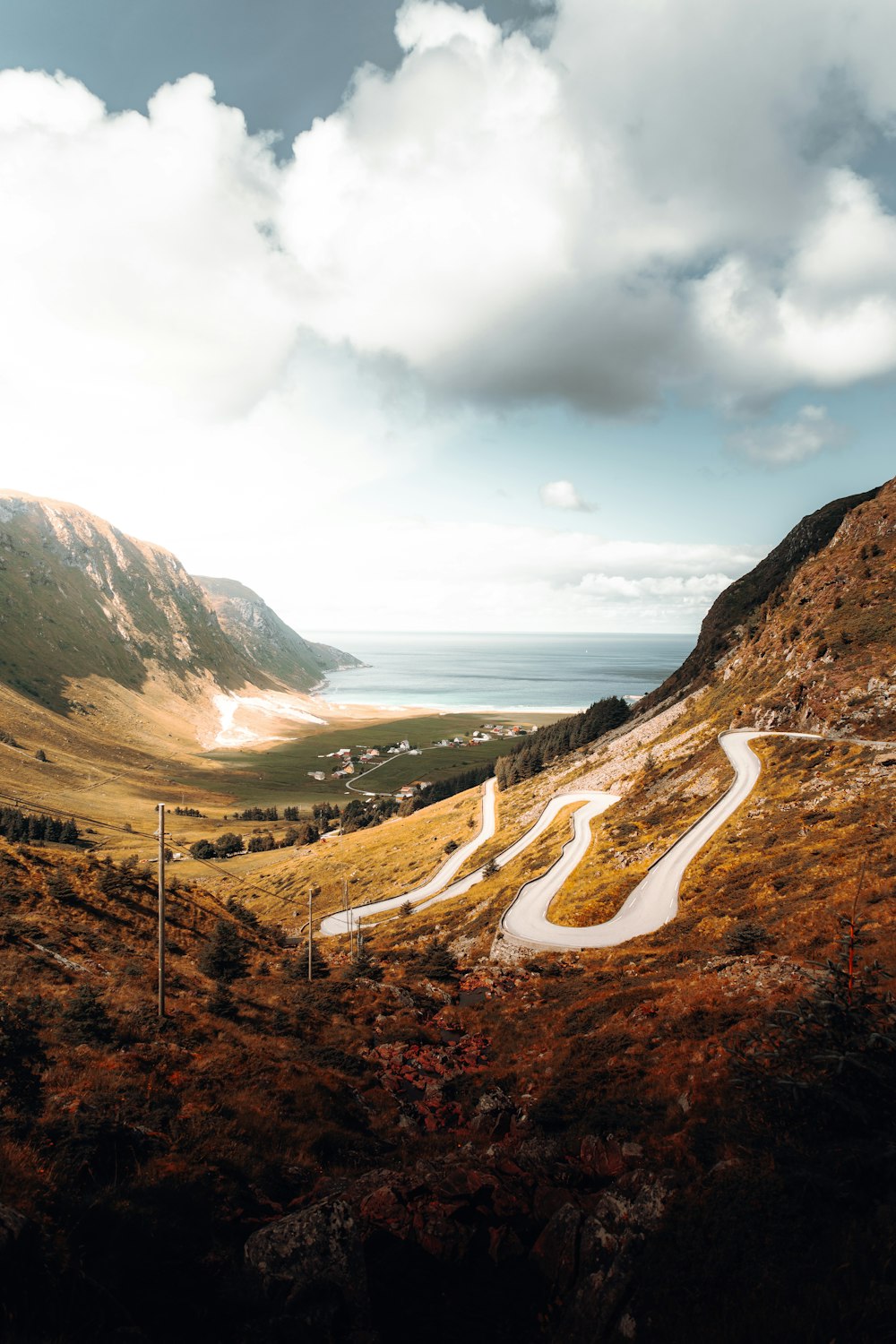 aerial view of road between mountains during daytime