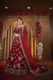 woman in red and white floral dress