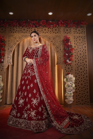 woman in red and white floral dress