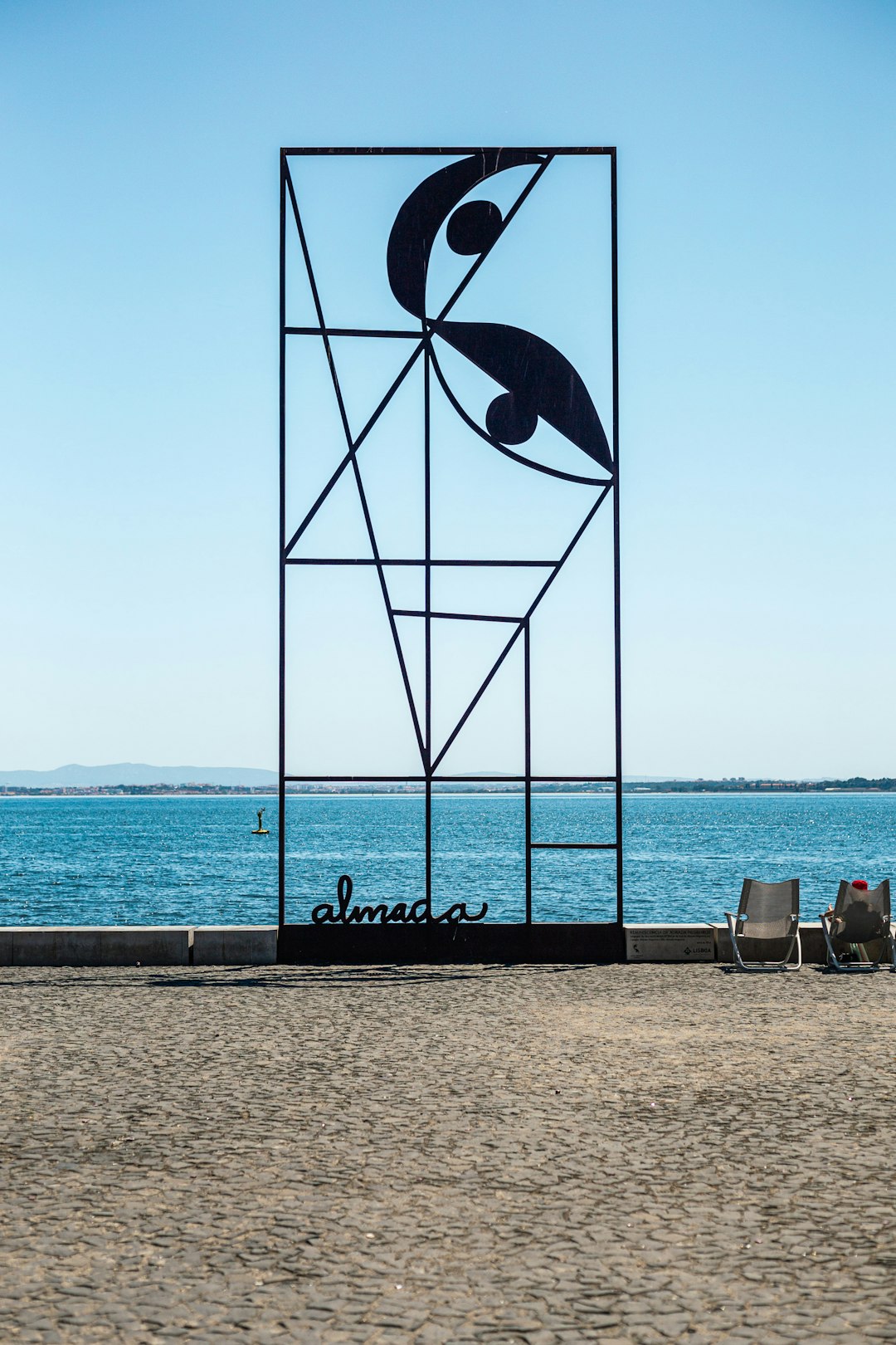 black metal frame on beach during daytime