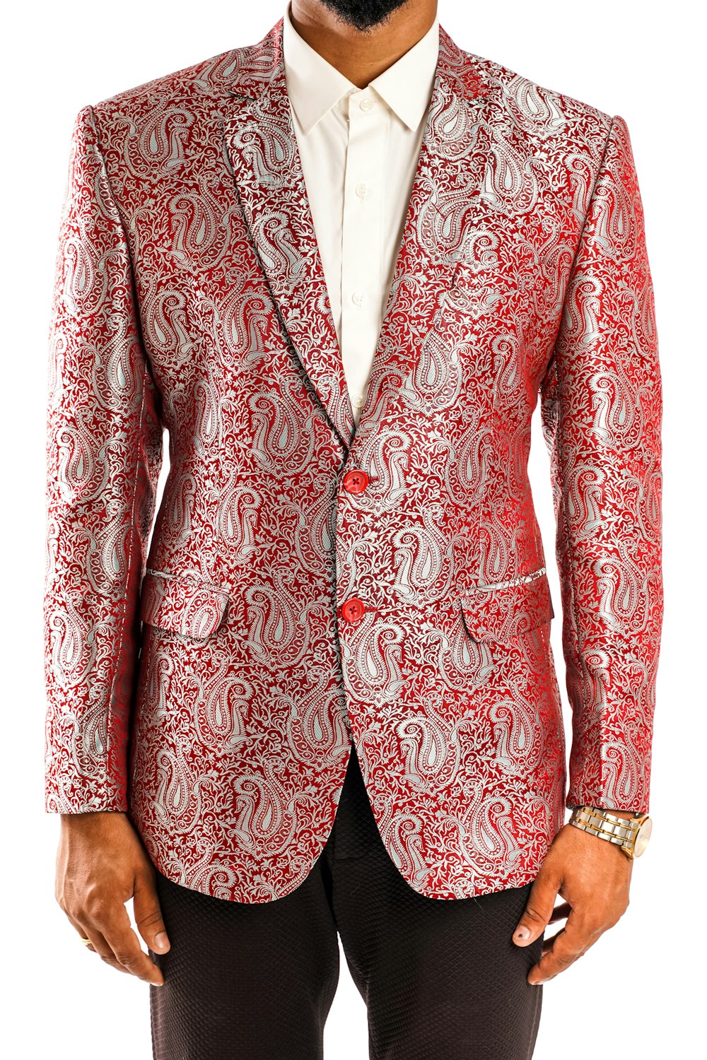 a man wearing a red and white paisley blazer