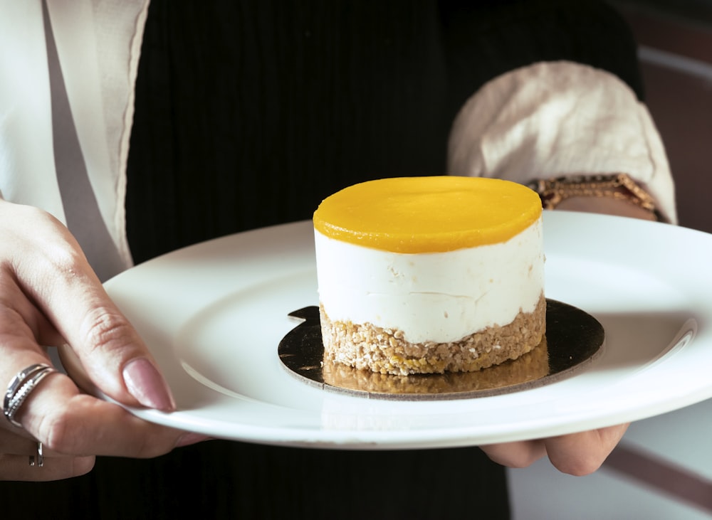 white and brown cake on white ceramic plate