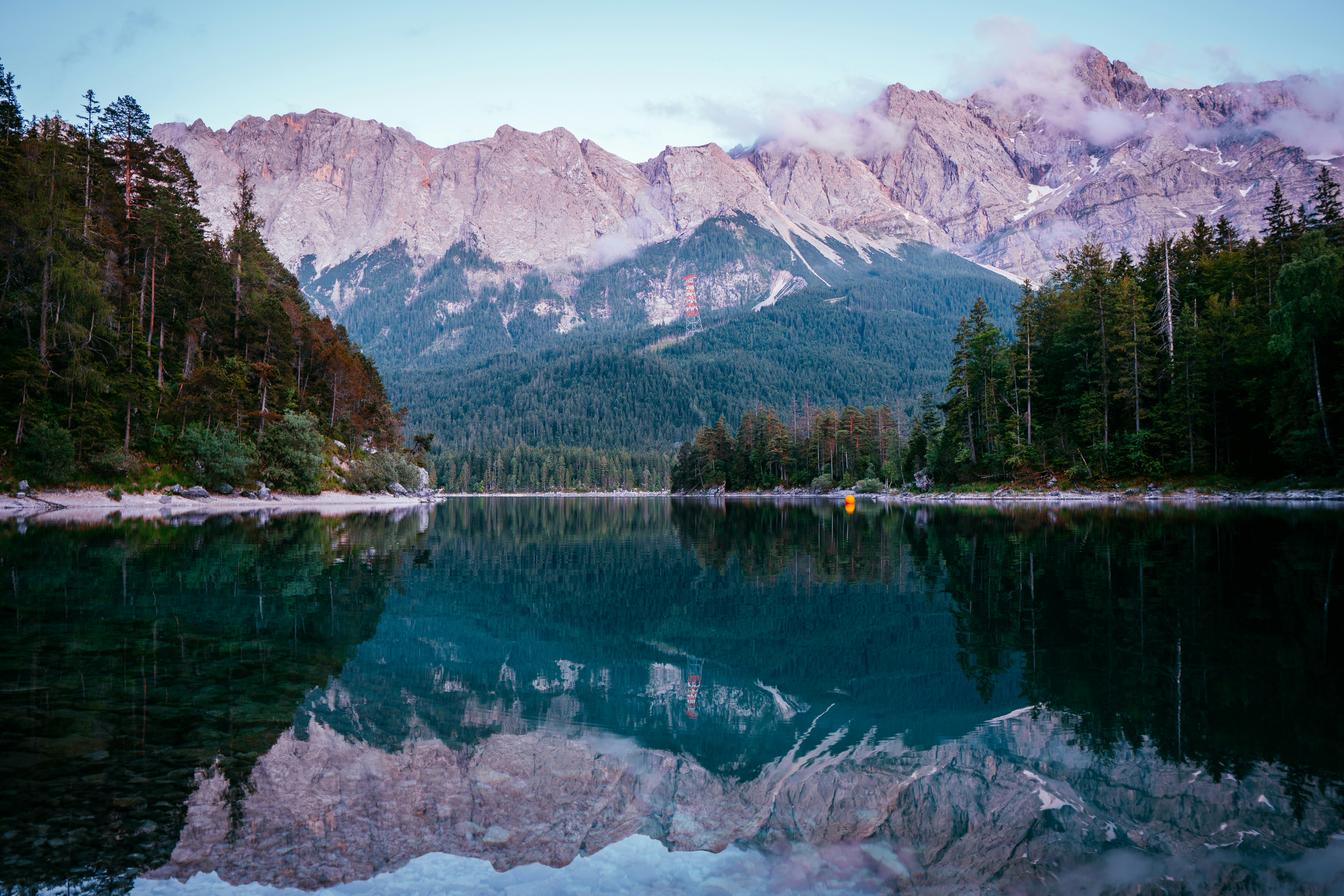 green trees near lake and mountain range, 