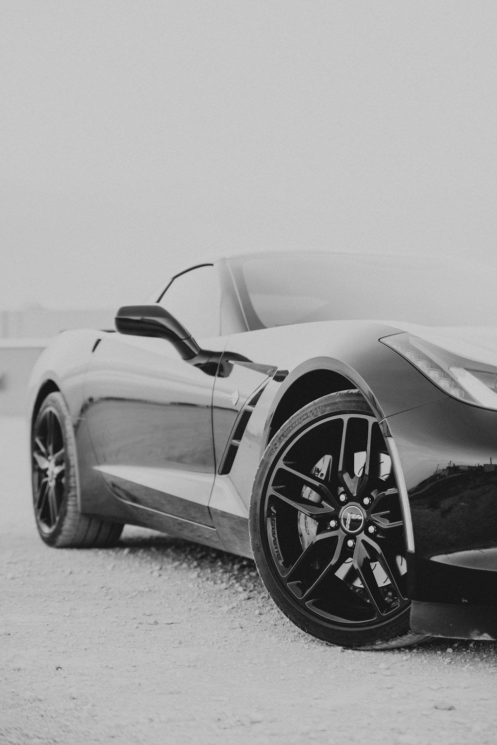 grayscale photo of sports car