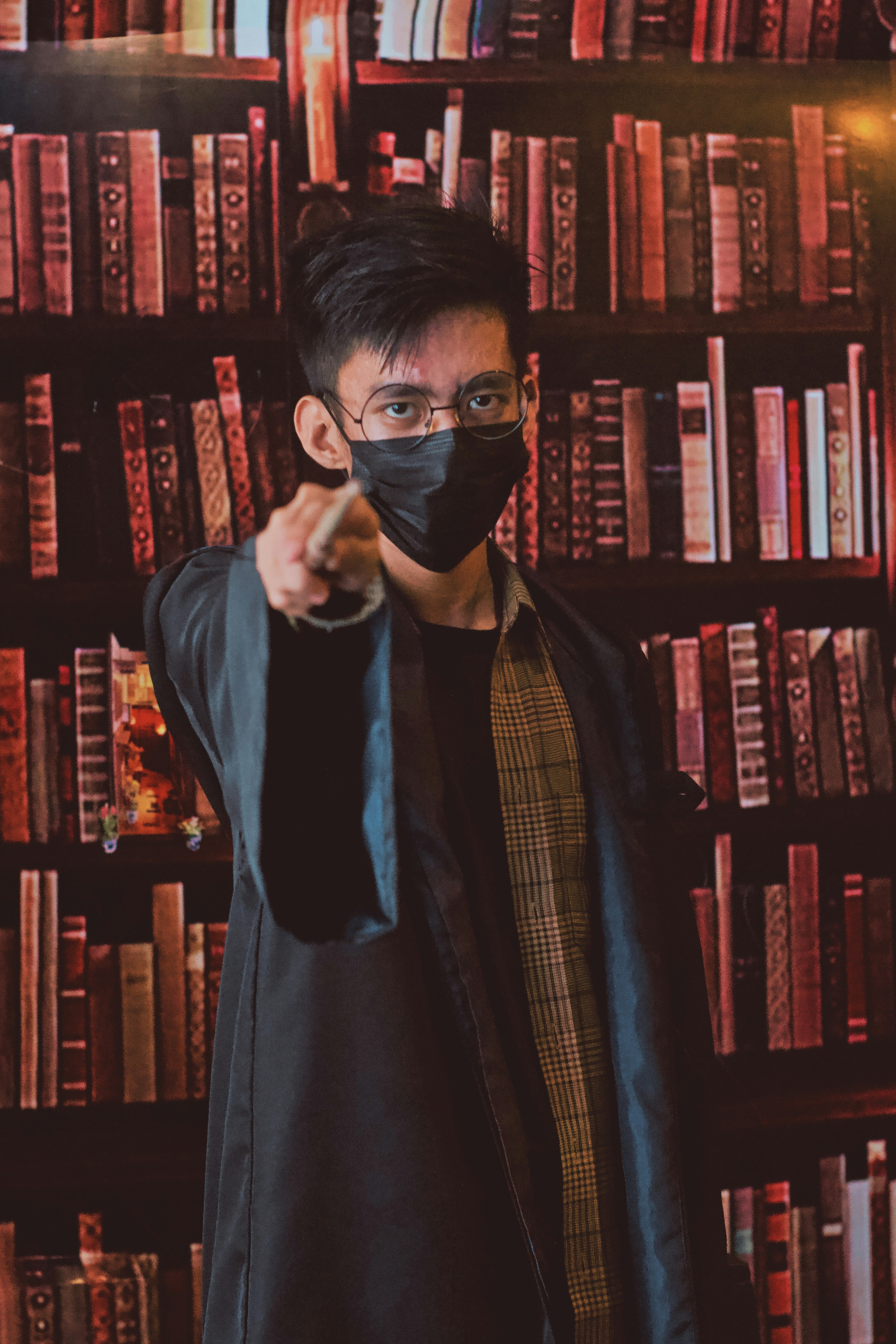 man in black suit jacket wearing black sunglasses