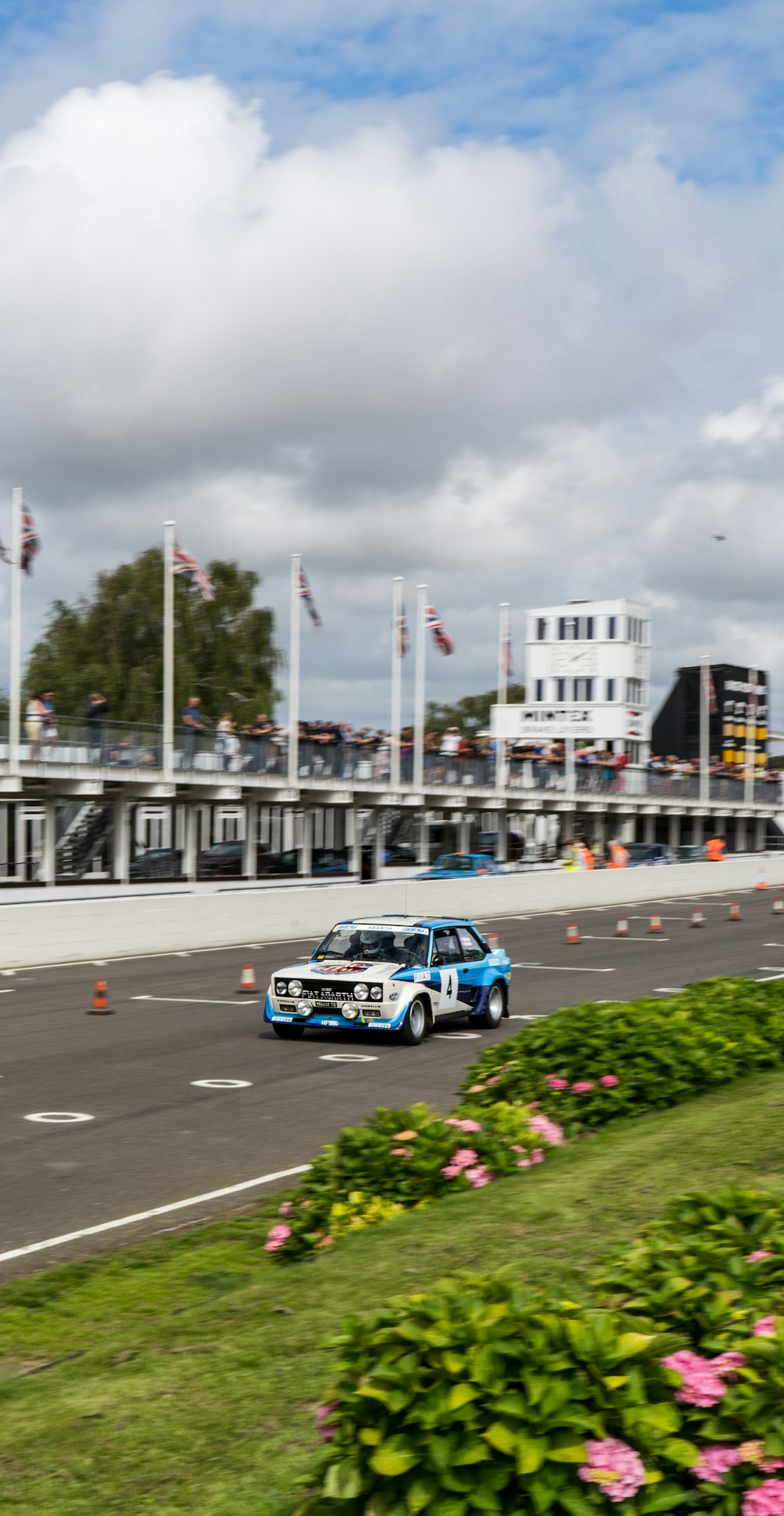 blue and white car on road during daytime