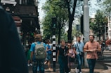 A group of students exploring a vibrant city street in Canada.