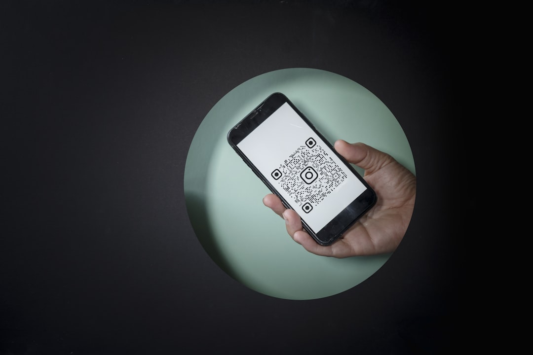 black and white digital device on green round plate, green pass