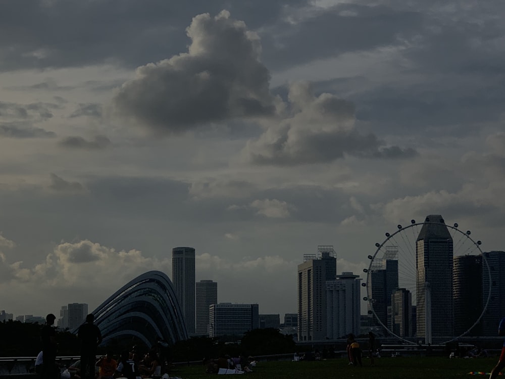 white clouds over city skyline during daytime