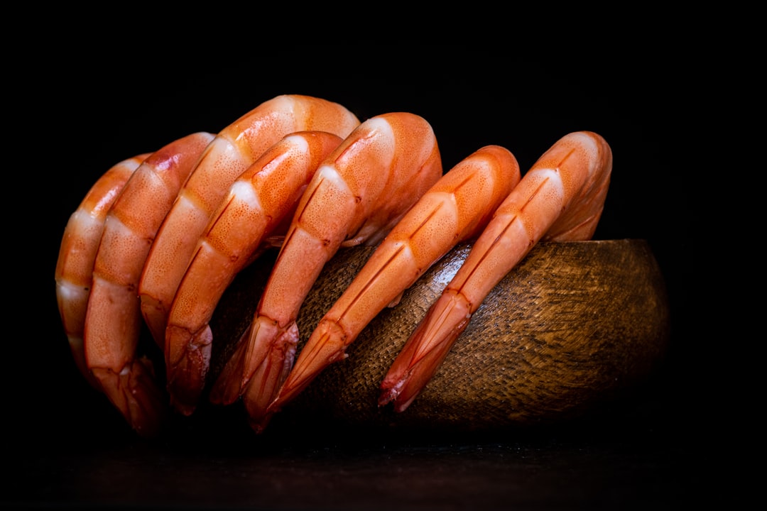 sliced carrots on black surface,