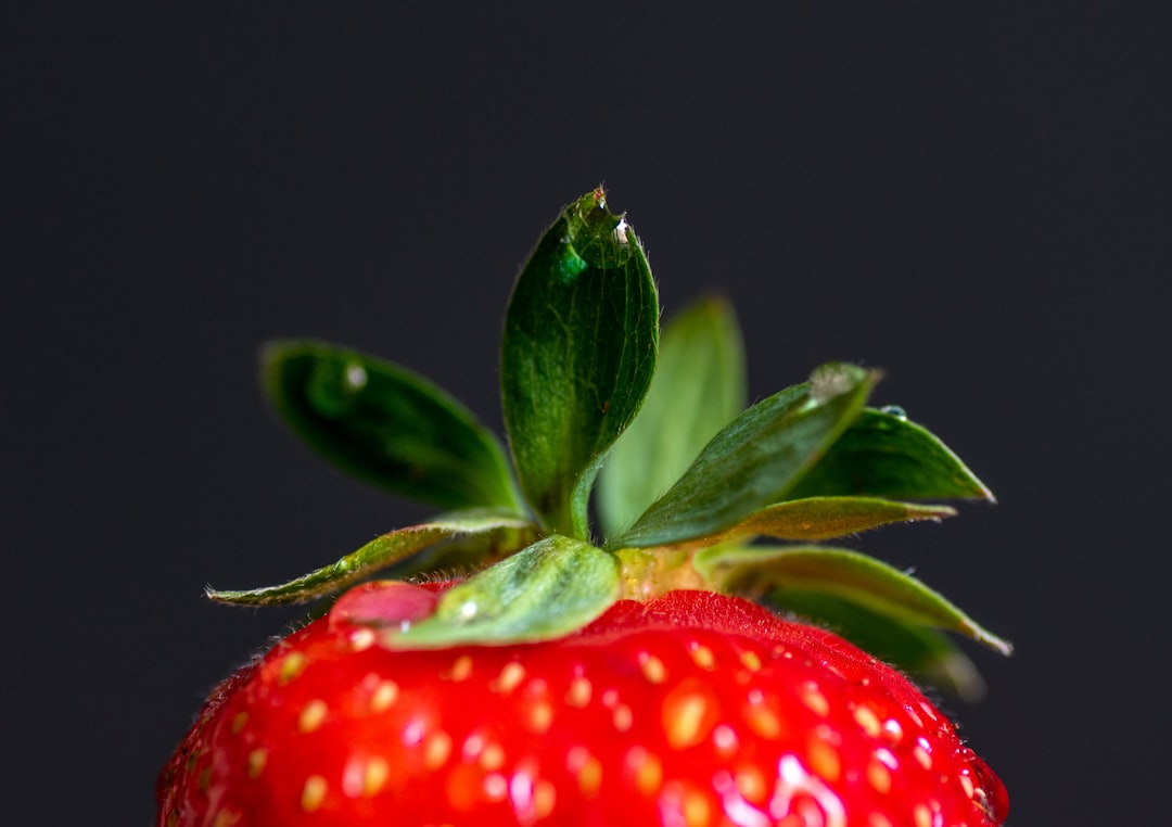 red strawberry with water droplets