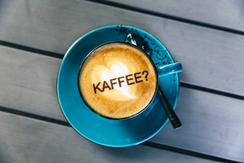 blue ceramic mug with coffee