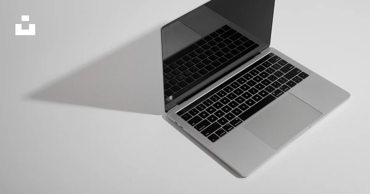 Macbook pro on white table photo – Free Computer Image on Unsplash