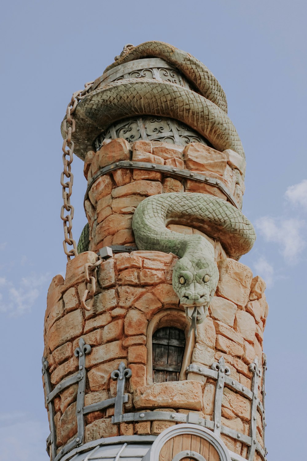 brown concrete tower under blue sky during daytime