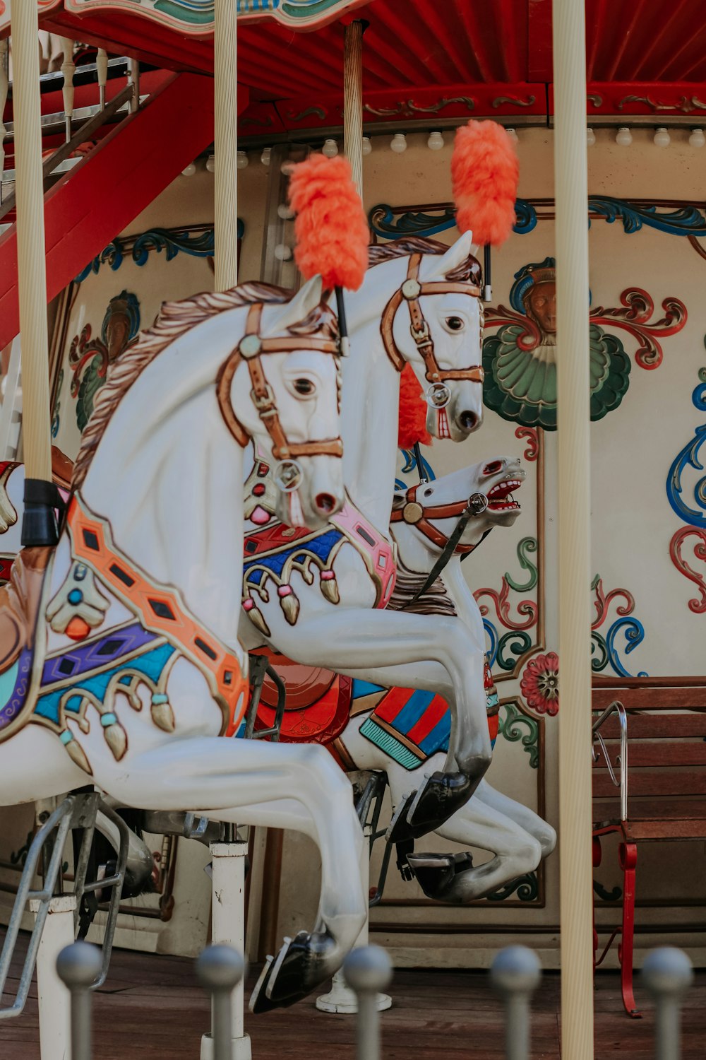 white red and blue horse carousel
