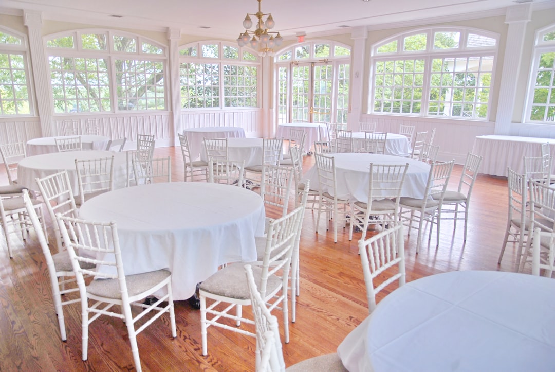 white and brown dining table and chairs set