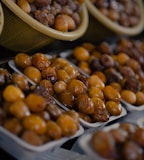 brown and white nuts on stainless steel tray