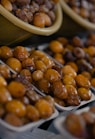 brown and white nuts on stainless steel tray