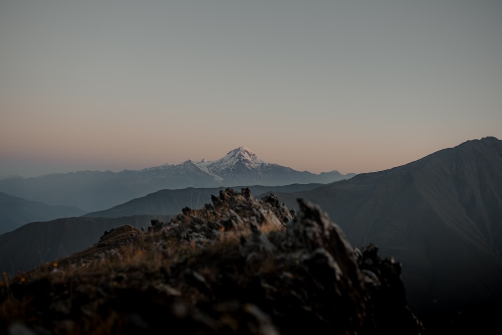 snow covered mountain during daytime