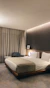 white bed with gray pillow