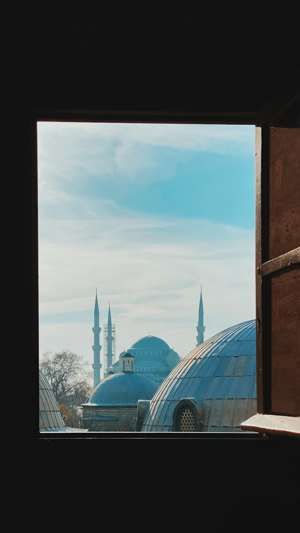 white and blue dome building under blue sky during daytime