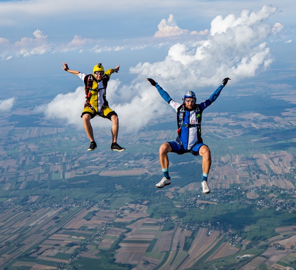 2 men jumping on air