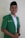 man in green polo shirt smiling