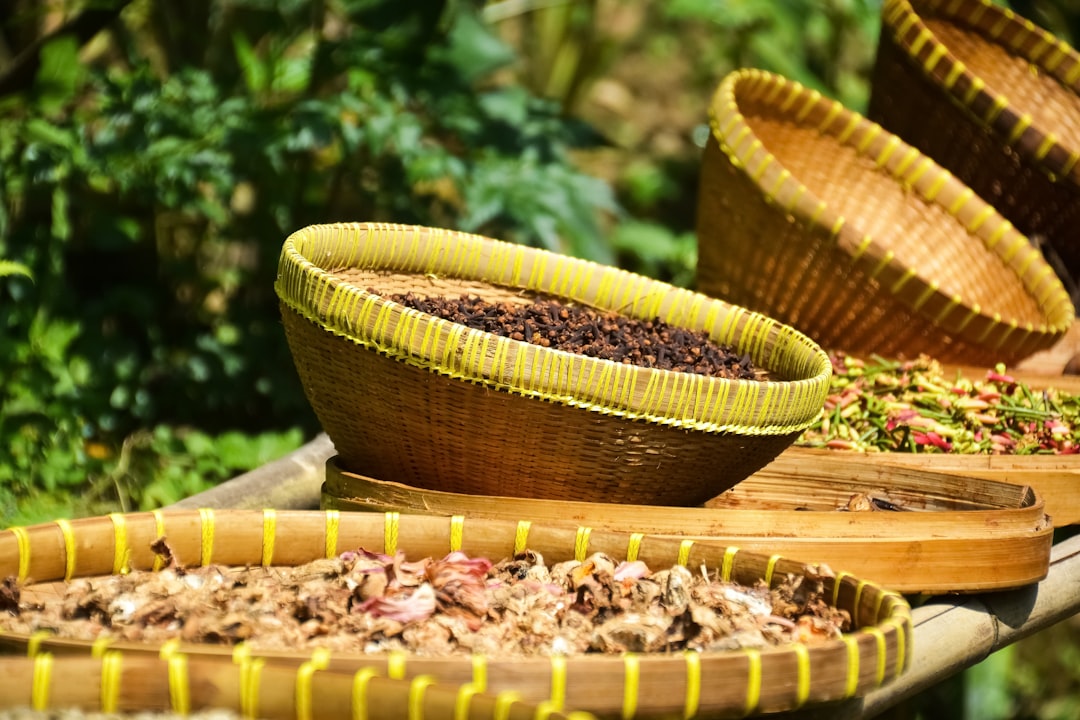 brown woven round basket on brown wooden table