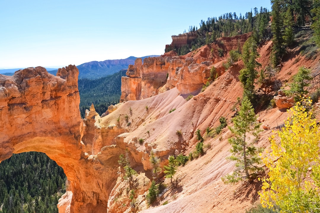 brown rocky mountain under blue sky during daytime