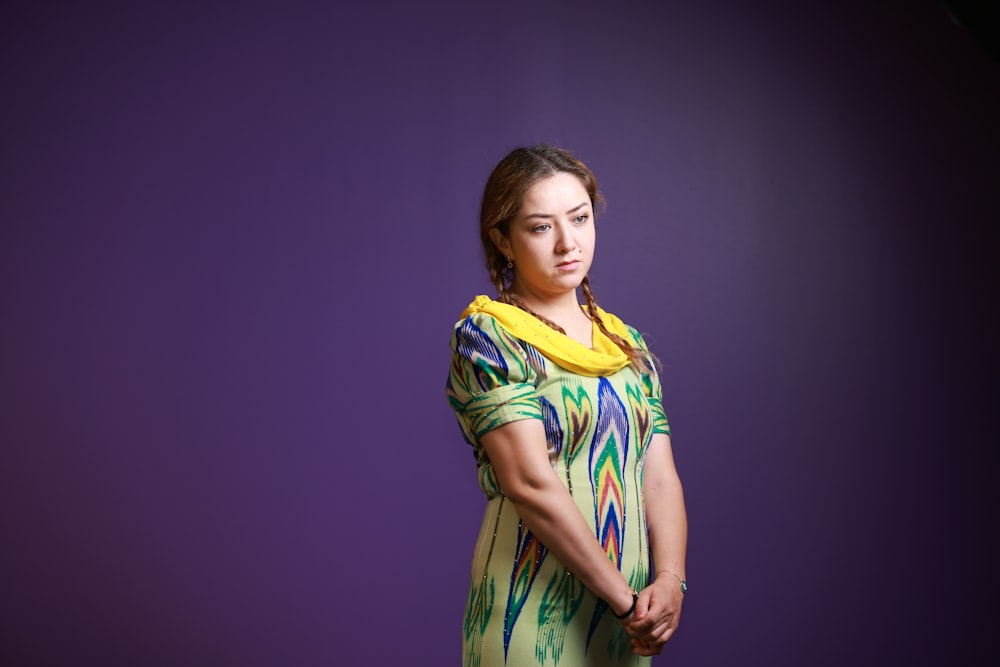 woman in yellow green and blue dress