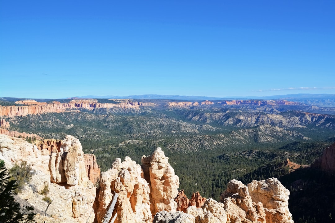 brown rocky mountain under blue sky during daytime